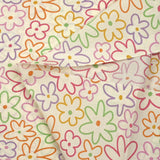 Algodón estampado contorno de flores sobre fondo crudo