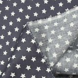 Algodón estampado estrellas 1cm gris