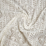 Polycotton crochet effect lace knit with off-white circled band
