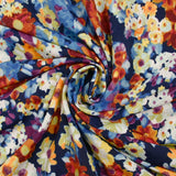 Maille crêpe imprimée fleurs bleu, orange et violet fond marine