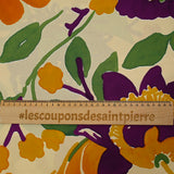 Coton imprimé fleurs orange et violet fond beige