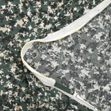 Jersey de coton froissé imprimé terrazzo fond vert foncé