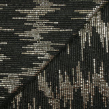 Maille fine polyester effet sequin en chevron doré fond noir