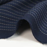 Tissu tailleur 100% laine rayé bleu et blanc fond marine