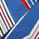 Jersey de viscose imprimé diagonales et paillettes fond bleu