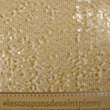Sequins sur tulle résille ambre
