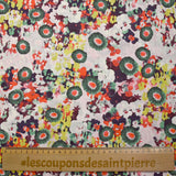 Fino estampado de prímula de algodón con fondo rosa pálido.