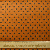 Velours ras imprimé pois fond orange brûlé