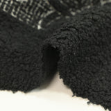 Lainage bouclette brodé esquisse florale fond noir