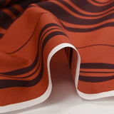 Coton fin imprimé rayures rouge orangé et marron