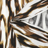 Crepe de viscosa estampado ondas abstractas marrón fondo blanco