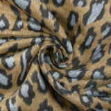 Jacquard de polyester peigné léopard bleu fond beige