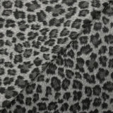 Jacquard de polyester peigné léopard fond gris
