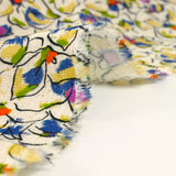 Lin viscose imprimé fleurs de pensées violet et vert fond écru