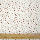 Jersey pointelle coton imprimé envolée de fleurs rose et brique fond blanc cassé