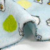 Edredón polar estampado con flores y patitos sobre fondo azul cielo