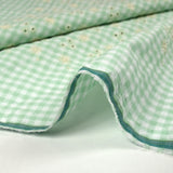 Cotton Vichy embroidered pastel green background