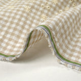 Cotton Vichy embroidered greige background