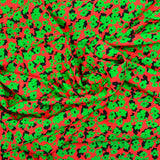 Viscose imprimée découpage vert fond rouge