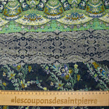 Crinkle chiffon printed with ornamental friezes in sea green and navy background