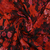 Crinkle muslin printed red and pink floral bouquet on black background
