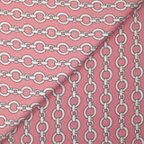 Lightweight polyester satin with white chain link print on pink background