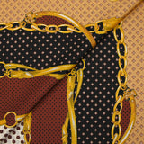 Satin polyester twill printed with gold straps on burgundy, ocher and black bands