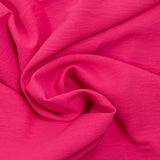 Crêpe polyester élasthanne contrecollé fuchsia