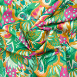Fondo verde de algodón de estampado rosa y naranja de Ginevra por metro