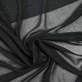 Mousseline paillettes argents fond noir