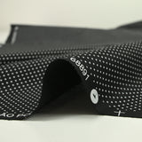 Dots printed cotton 1mm black background