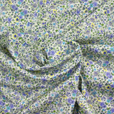 Cotton printed Giorgia purple flowers and blue background ecru per meter
