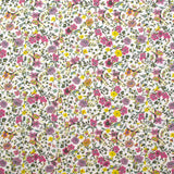 Anna Purple y amarillo Fondo blanco de algodón estampado en blanco por el medidor