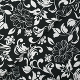 Viscose satin printed flowers in arabesque black background