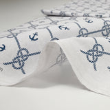 Polycotton printed knot and ink white background