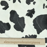 Fausse fourrure poils mi-longs vache noir