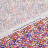 Flores de estampado de algodón Matilde Coral y lavanda por metro