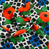 Sergé de coton et viscose coquelicot et mosaïque fond blanc cassé