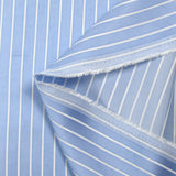 Striped woven-dyed polyviscose satin with sky blue background