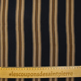 Viscose crepe with brown striped print on black background