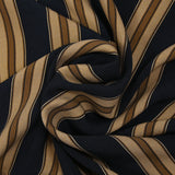 Viscose crepe with brown striped print on black background
