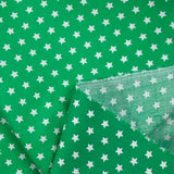 Algodón estampado estrellas 1cm verde