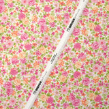 Piqué de coton imprimé les fleurs de Sarah rose et orange fond blanc