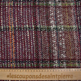 Capucine wool blend tweed green and black line wine background