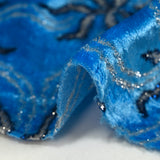 Jersey de terciopelo lurex estrella de mar fondo azul