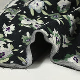 Viscose matelassée fleurs vertes fond bleu nuit envers noir