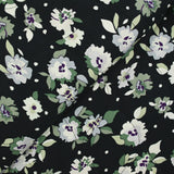 Viscose matelassée fleurs vertes fond bleu nuit envers noir