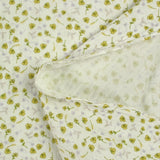Double printed gauze flowers romy yellow broken white background