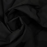 Jeans negros con estampado de camuflaje