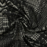 Maille Milano polyviscose chevrons patchwork gris fond noir